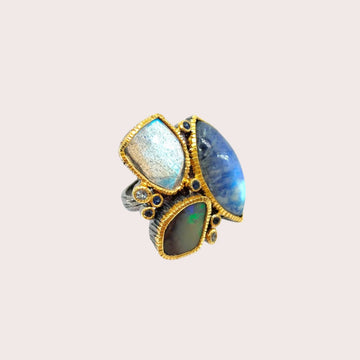 One Of A Kind Spectrolite Boulder Opal Labradorite Blue Topaz And Blue Sapphire Ring