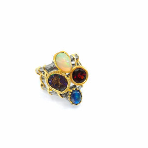 One Of A Kind Ethiopian Opal Spectroltie And Garnet Ring
